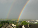 27059 Double rainbow over houses and fields.jpg